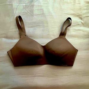 Lululemon Thick-strap Bra. Clasps in back. Size 34D